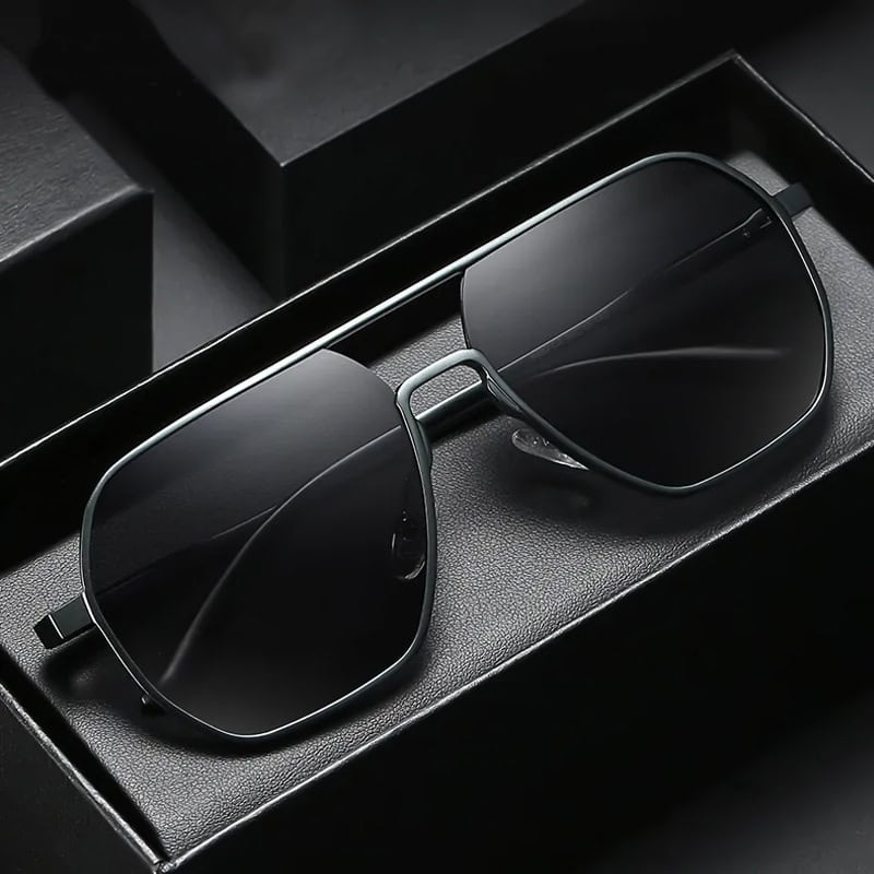 High-quality black sunglasses with sleek design, perfect for stylish vision protection and sun shading. Ideal for both men and women, offering UV protection and fashion-forward appeal.