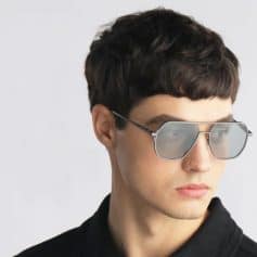 Men's fashion sunglasses with modern design, UV protection, and durable frame ideal for everyday wear and outdoor activities. Perfect for enhancing style and eye protection.
