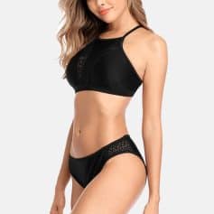 Comfortable black sports bra with breathable mesh panels, ideal for activewear and daily comfort. Perfect for women seeking stylish, supportive workout clothing and premium optical accessories.