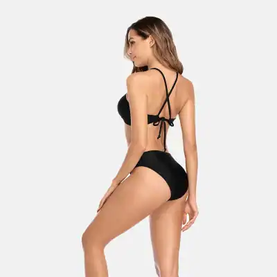 High-quality black bikini swimwear with adjustable straps and a stylish tie-back design. Perfect for beach, pool, and summer vacations. Comfortable fit and fashionable look for women.