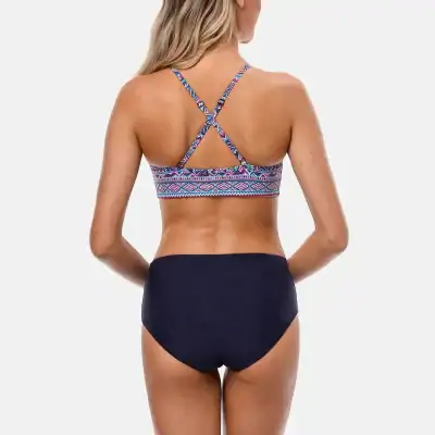 Vibrant tribal patterned bikini top with stylish criss-cross straps, perfect for beach or poolside fashion. Comfortable, trendy swimwear for women by Monalisa Store.