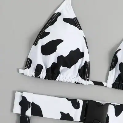 Opt for fashionable cow print bikini swimsuit featuring adjustable straps, perfect for summer beach days, swimming, and poolside activities. Designed for comfort and style.