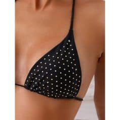 Close-up of a stylish black bikini top adorned with rhinestones, perfect for summer beachwear, swimwear fashion, and women's stylish swim tops.
