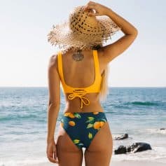 Women’s stylish bikini with floral and fruit patterns, perfect for beach trips and summer vacations. Shop high-quality swimsuits at Monalisa Medical for a comfortable and fashionable look.