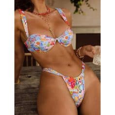 A vibrant, patterned bikini set with a flattering cut, perfect for beach or poolside wear. Crafted for comfort and style, ideal for summer vacations and tropical getaways.