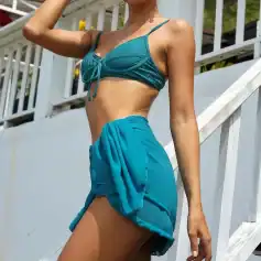 High-quality blue bikini with comfortable straps, perfect for summer beachwear and swimming. Designed for a flattering fit and durability, ideal for active lifestyles and beach outings.