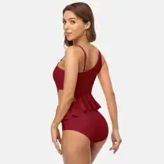 Red women's shapewear with waist control, ruffle detailing, and comfortable fit for enhanced silhouette. Ideal for slimming and fashionable wardrobe essentials.