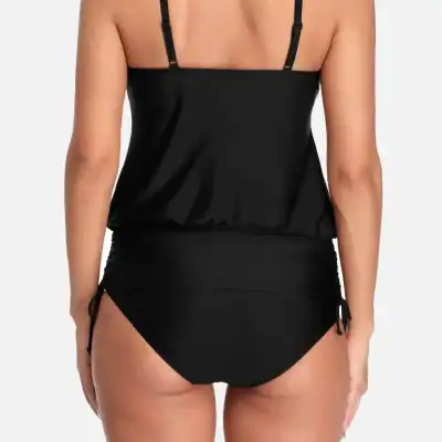 Comfortable black tankini top and high-waisted bikini bottom for women, perfect for swimming and beach activities. Flattering fit, available in plus sizes, ideal for confident and stylish swim looks.