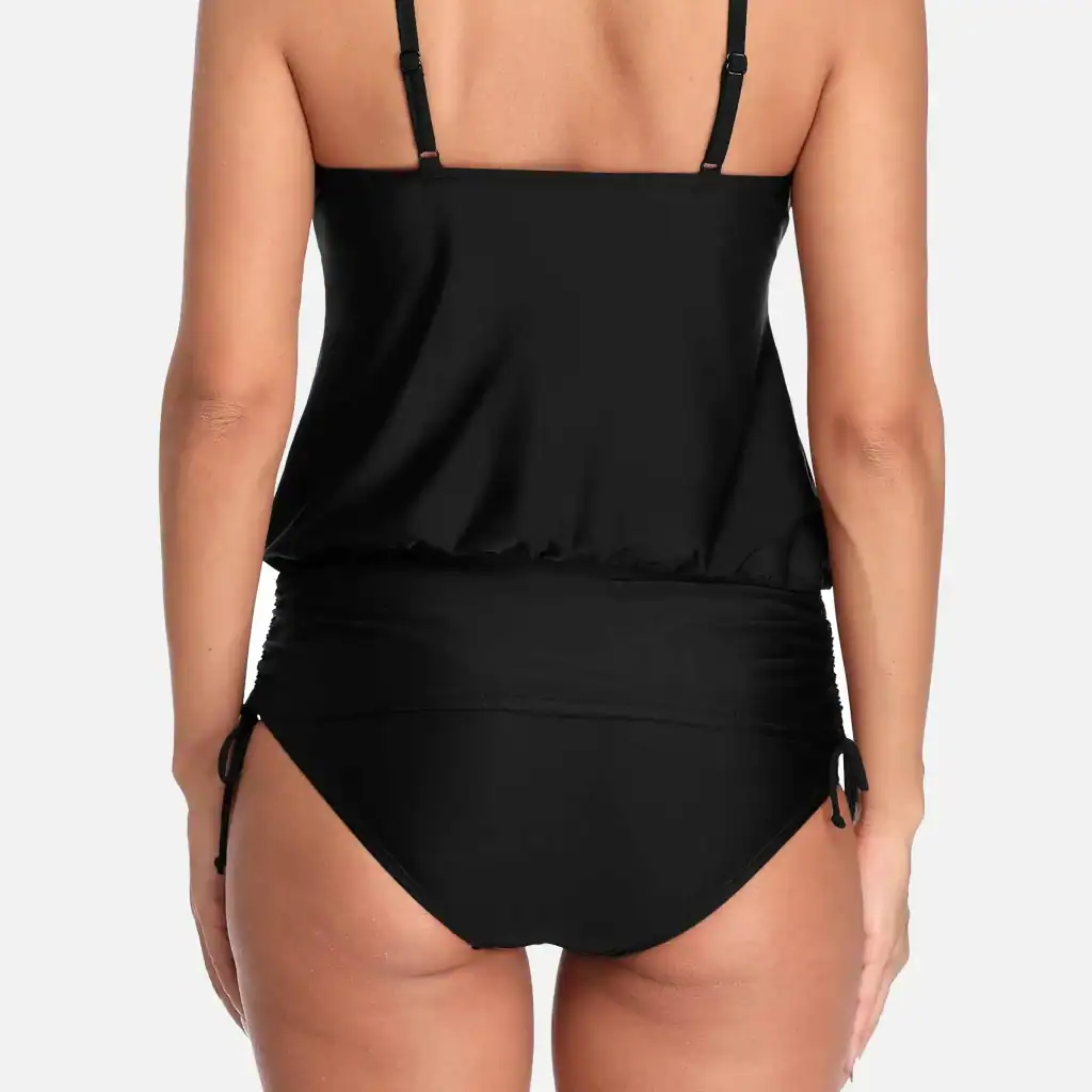 Comfortable black tankini top and high-waisted bikini bottom for women, perfect for swimming and beach activities. Flattering fit, available in plus sizes, ideal for confident and stylish swim looks.