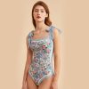 Stunning floral swimsuit featuring bow shoulder details, ideal for stylish swimwear at Monalisa Store or opt for fashionable beachwear.