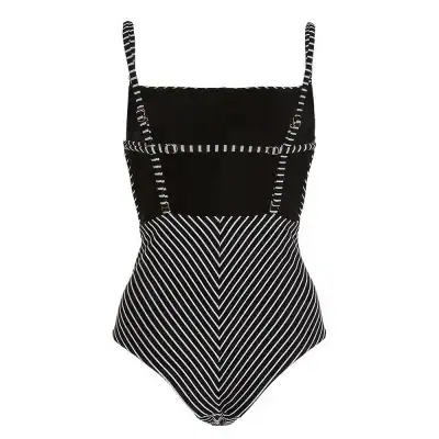 Stylish black and white striped swimsuit with cutout details, perfect for summer beachwear and poolside relaxation.