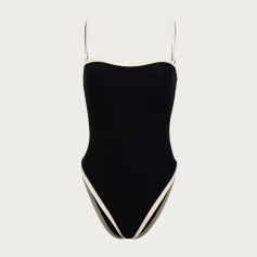 Elegant black and white one-piece swimsuit with stylish design, ideal for beach or poolside fashion, perfect for women seeking trendy swimwear options.