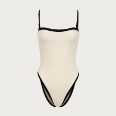 Stylish women's fashion body suit for casual or dressy wear, featuring a sleek white design with black accents, perfect for modern fashion statements.