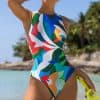 Colorful tropical print one-piece swimsuit for women, perfect for beach and swimming activities. Stylish, comfortable, and beach-ready swimwear designed for summer vacations and seaside outings.