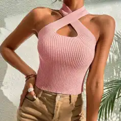 Stylish pink ribbed sleeveless top featuring a unique cutout design, perfect for summer wear and fashion-forward looks.