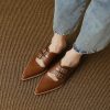 High-quality brown leather pointed-toe shoes with double buckle straps, perfect for casual or formal wear. Ideal for elevating your fashion statement with comfort and elegance.
