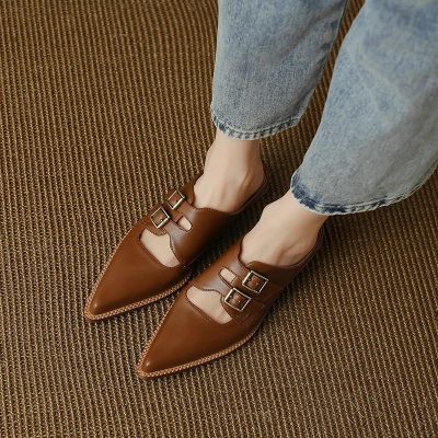 High-quality brown leather pointed-toe shoes with double buckle straps, perfect for casual or formal wear. Ideal for elevating your fashion statement with comfort and elegance.