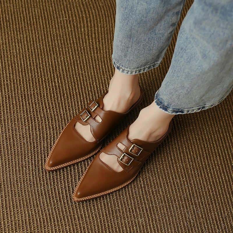 High-quality brown leather pointed-toe shoes with double buckle straps, perfect for casual or formal wear. Ideal for elevating your fashion statement with comfort and elegance.