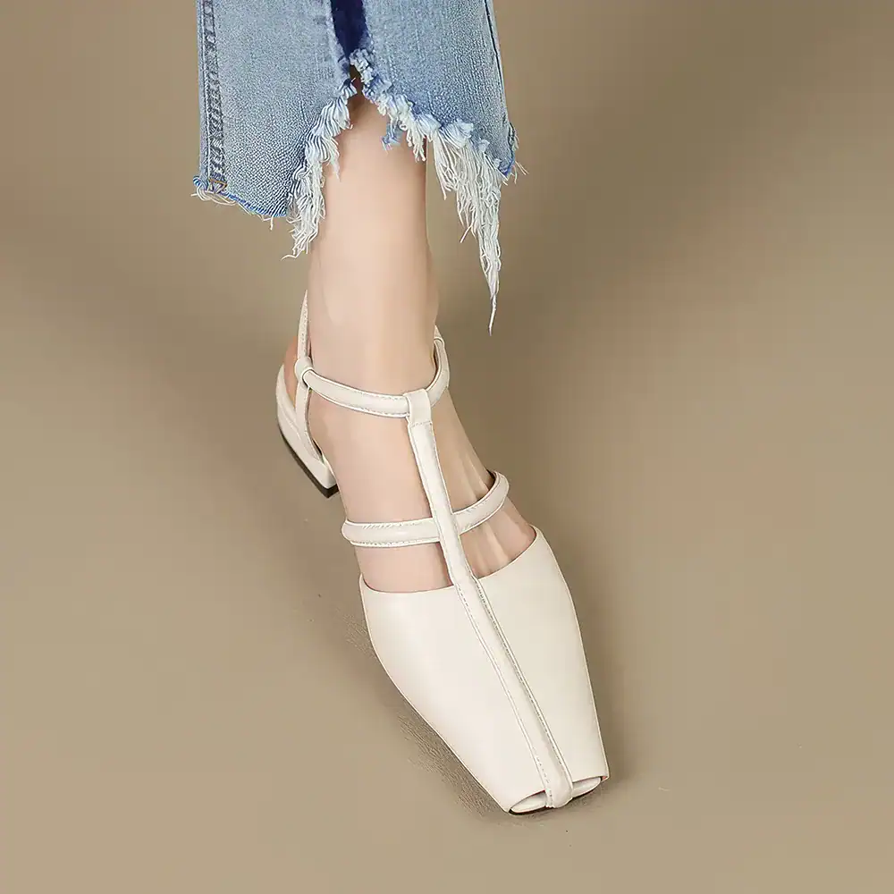 Stylish beige high heel sandal with ankle straps and open toe, perfect for fashionable women.