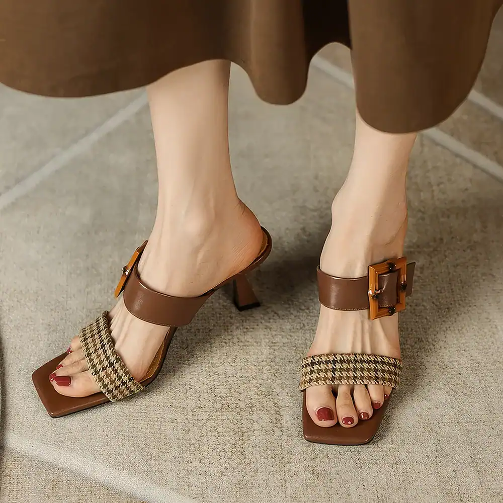 Stylish brown high-heeled sandals with houndstooth fabric accents and decorative buckles, perfect for fashion-forward women seeking comfort and style.