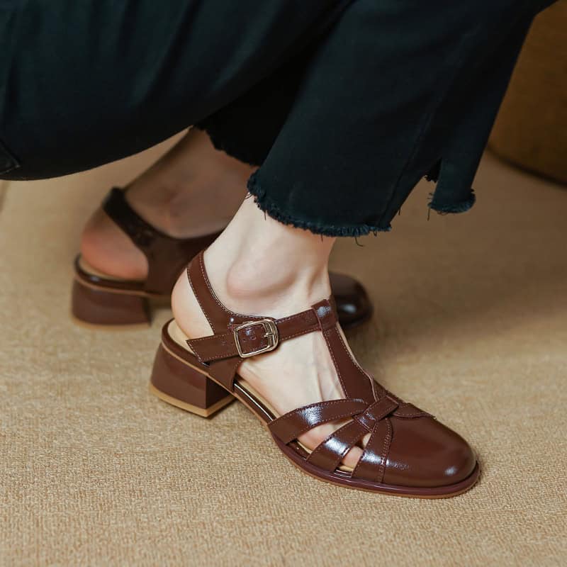 Comfortable brown leather women’s sandals with block heel, ankle strap, and buckle for stylish and supportive footwear. Perfect for casual or dressy outfits.