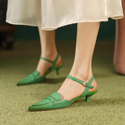 Stylish green pointed-toe heeled shoes with ankle strap, perfect for fashion enthusiasts. Enhance your wardrobe with these chic, comfortable shoes suitable for any occasion.