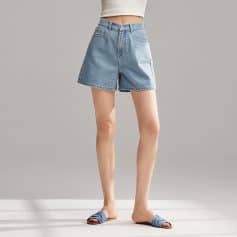 Light blue denim shorts for women, stylish and casual, perfect for summer and vacation outfits. Comfortable fit with trendy design.