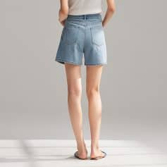 Girls' light blue high-waisted denim shorts from Monalisa Store, perfect for summer casual wear and outdoor activities. Stylish, comfortable, and trendy for everyday fashion.