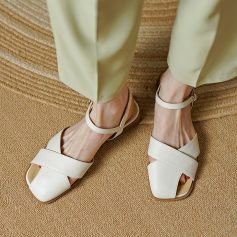 Comfortable beige sandals with ankle strap and open toe, perfect for fashion-conscious individuals seeking trendy footwear.