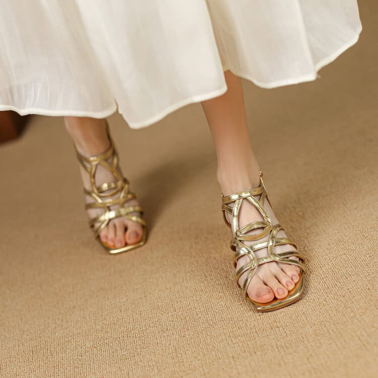 High-heeled gold sandals perfect for special occasions and stylish outfits.