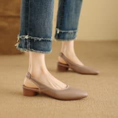 Beautiful beige pointed-toe flats for women, featuring a comfortable low heel and elastic side for easy wear, perfect for stylish everyday footwear.