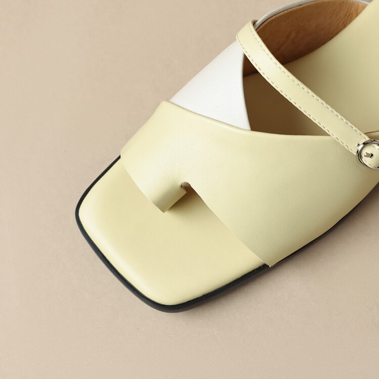 Stylish yellow square-toe women's shoe with ankle strap, perfect for fashionable eyewear accessories. Made with high-quality materials for comfort and style.