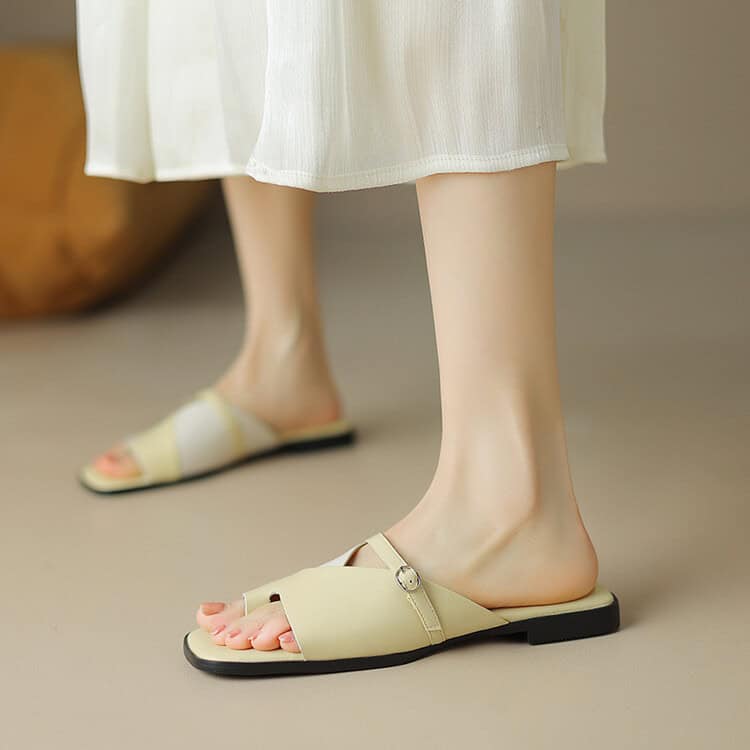 High-quality women's slip-on sandals perfect for casual wear, featuring cushioned soles, breathable design, and stylish appearance for everyday comfort and fashion.