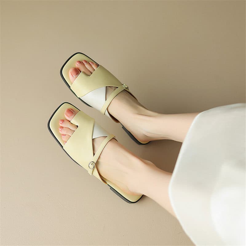 Fashionable yellow open-toe sandals with ankle straps, perfect for summer and casual occasions.