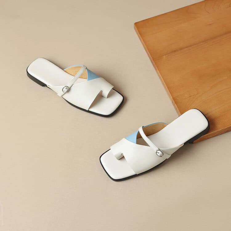 Stylish white women's sandals with a modern design, featuring comfortable straps and adjustable fittings. Perfect for summer outings, casual wear, and adding a touch of elegance to your outfit.
