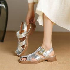 Comfortable metallic women's sandals with adjustable buckle straps, perfect for summer and casual wear. Featuring a trendy design, ideal for fashionable, everyday footwear.