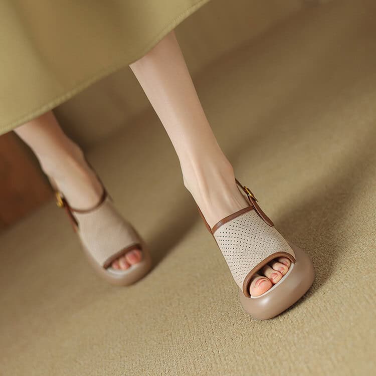 Close-up of beige open-toe women's shoes with ankle straps, perfect for fashion-conscious individuals. Comfortable and trendy footwear ideal for everyday wear or special occasions.