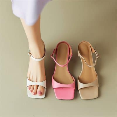 Elegant open-toe women’s sandals with ankle straps, perfect for fashion-forward individuals. Available in stylish colors to complement any outfit.