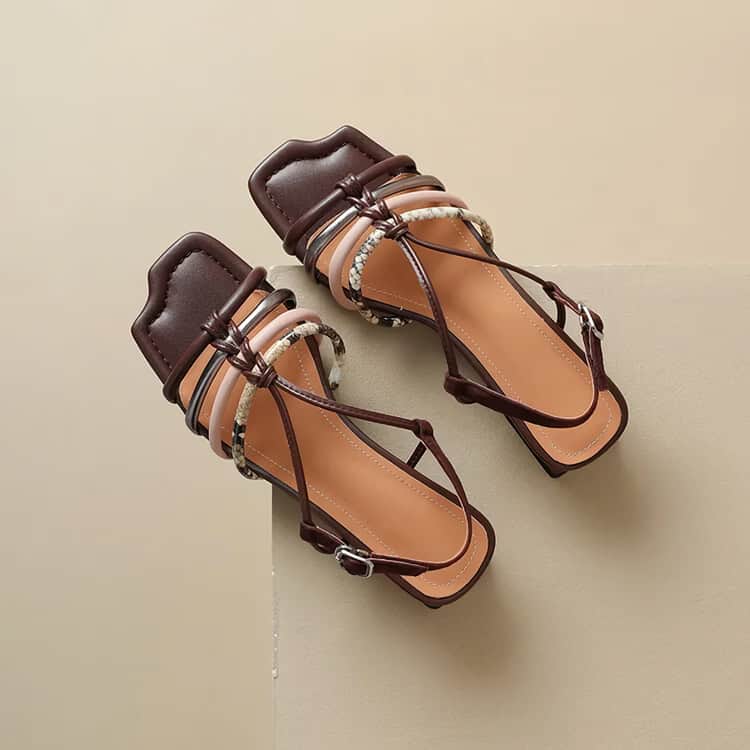 Stylish women's open-toe sandals featuring ankle straps and decorative accents, ideal for warm weather. Crafted with premium materials for comfort & fashion, perfect for complements in everyday or special outfits.