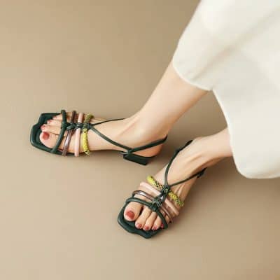 Stylish women's sandals with multiple straps and colorful accents, ideal for summer or vacation outfits. Shop now at Monalisa Medical Store for the latest in fashionable footwear.