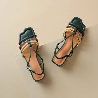 Stylish green sandals with unique strap design, perfect for summer and casual wear, available at Monalisa Store.