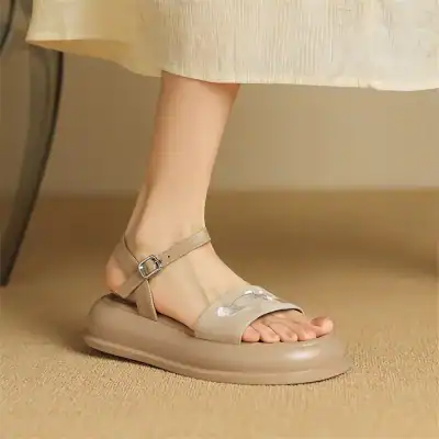 Comfortable beige orthopedic sandals with ankle straps and cushioned soles, designed for foot health and everyday wear. Perfect for those seeking both style and support.