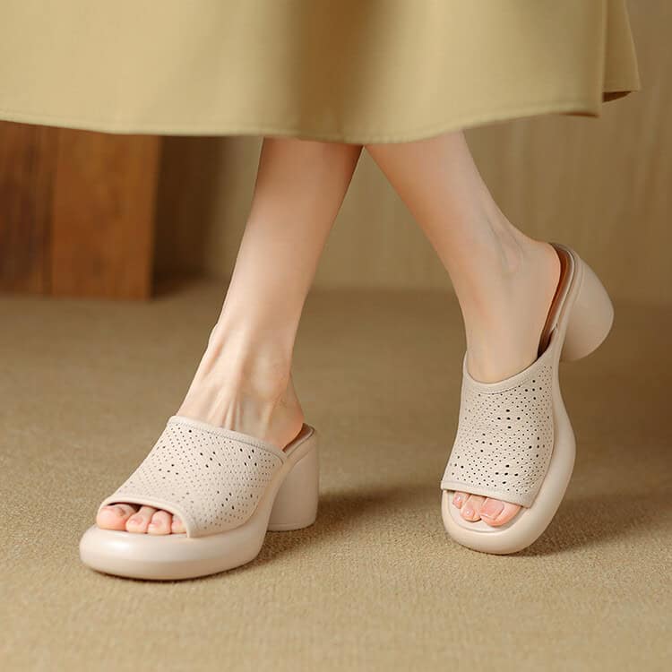 Stylish and breathable women's slip-on shoes with perforated design, perfect for spring and summer wear. Easy to put on and comfortable for everyday use, ideal for casual or office outfits.