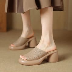 Stylish beige platform heels with perforated design, perfect for fashion-forward looks and comfort. Made from high-quality materials for durability and elegance.