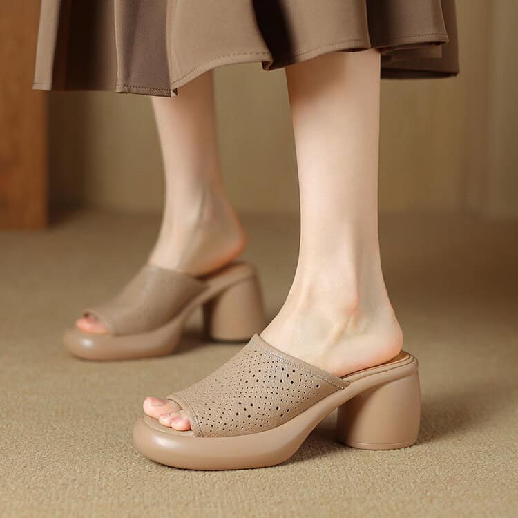 Stylish beige platform heels with perforated design, perfect for fashion-forward looks and comfort. Made from high-quality materials for durability and elegance.