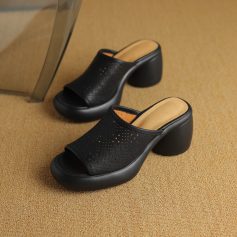 Comfortable black open-toe high heel shoes with perforated design for women. Perfect for casual and formal occasions, combining elegance with comfort.
