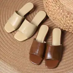 Elegant beige and brown slip-on sandals for women, perfect for casual and summer wear. Comfortable, trendy, and versatile for everyday fashion.