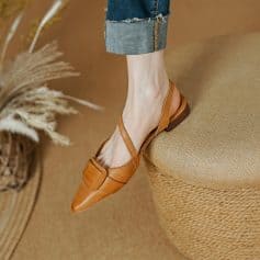 Stylish tan leather sandals perfect for casual or office wear, featuring a pointed toe, buckle detail, and comfortable low heel for versatile fashion.
