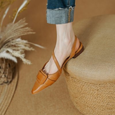 Stylish tan leather sandals perfect for casual or office wear, featuring a pointed toe, buckle detail, and comfortable low heel for versatile fashion.