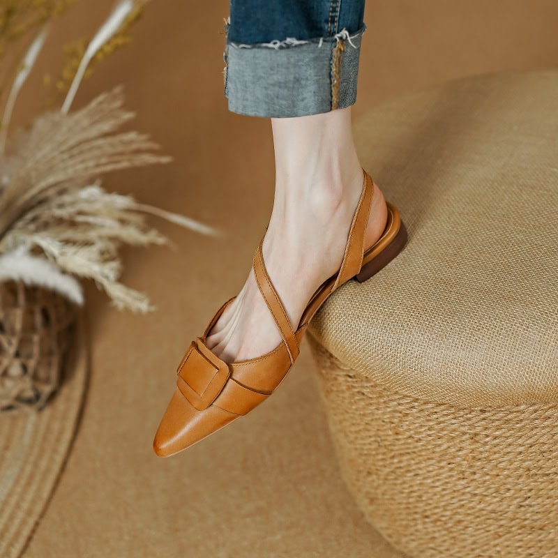 Stylish tan leather sandals perfect for casual or office wear, featuring a pointed toe, buckle detail, and comfortable low heel for versatile fashion.